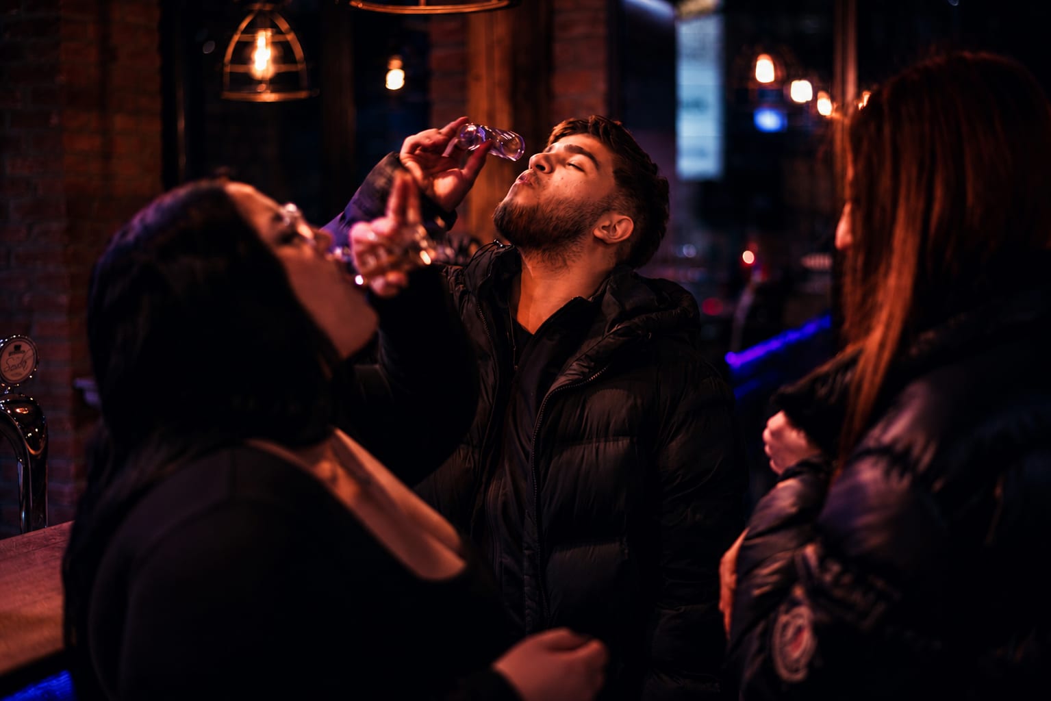 Bandita event content — guests sharing a moment at night